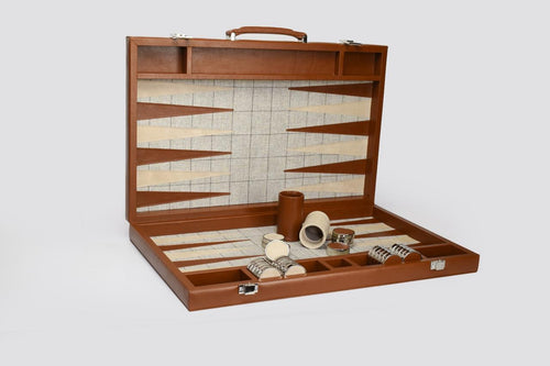 The Stag Backgammon in cognac full-grain leather, case open, with checkers and dice cups